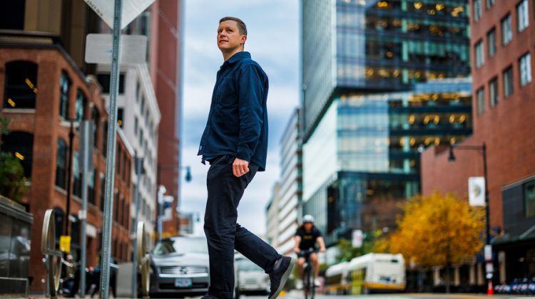 man walking in street